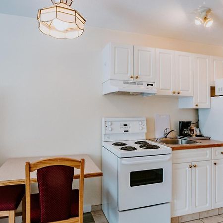 Western Budget Plus Mosaic Suites Penhold Extérieur photo
