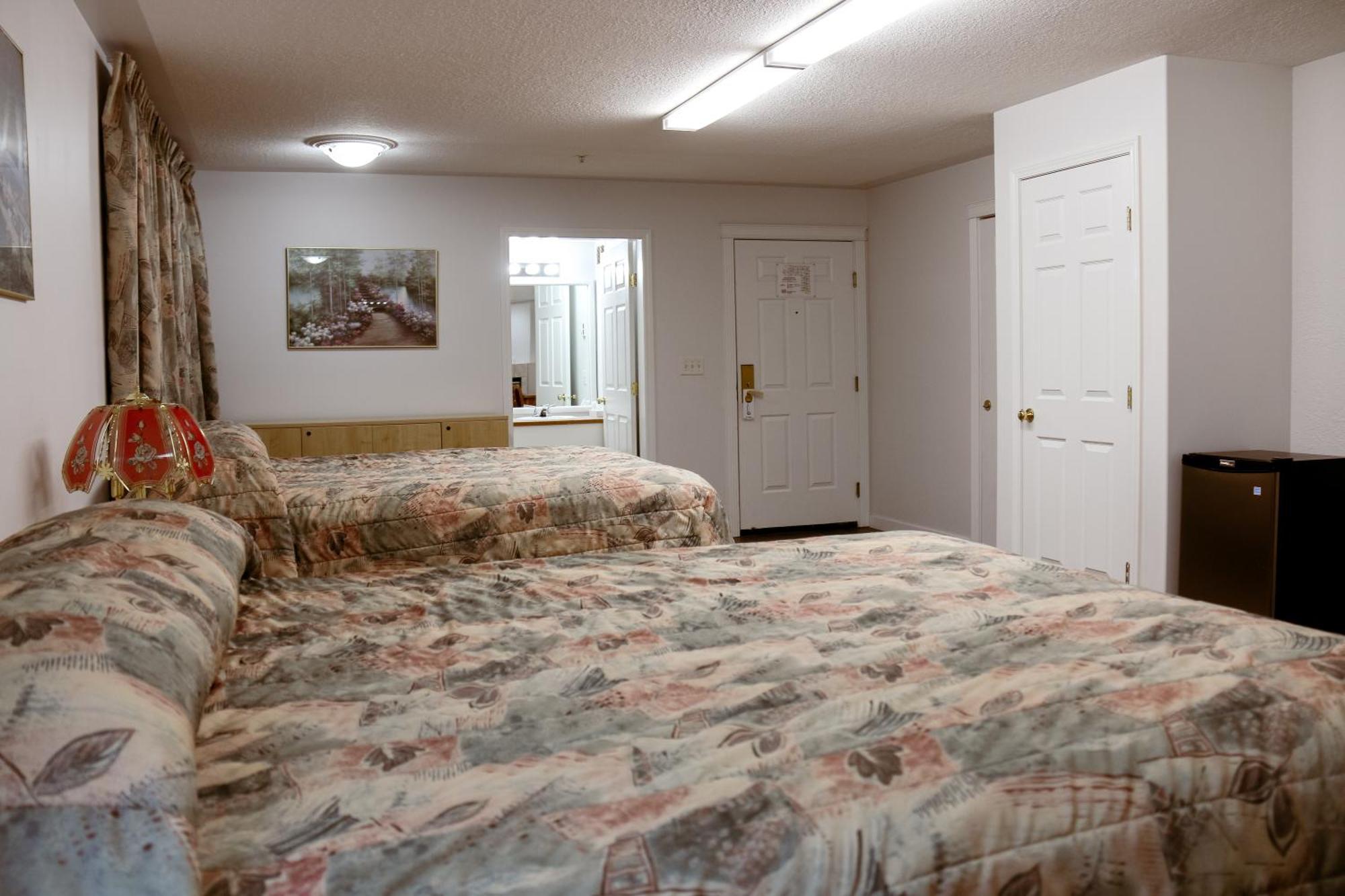 Western Budget Plus Mosaic Suites Penhold Extérieur photo